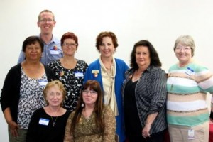 Interfaith Community Services Graduates and Staff with Greg Anglea, CEO